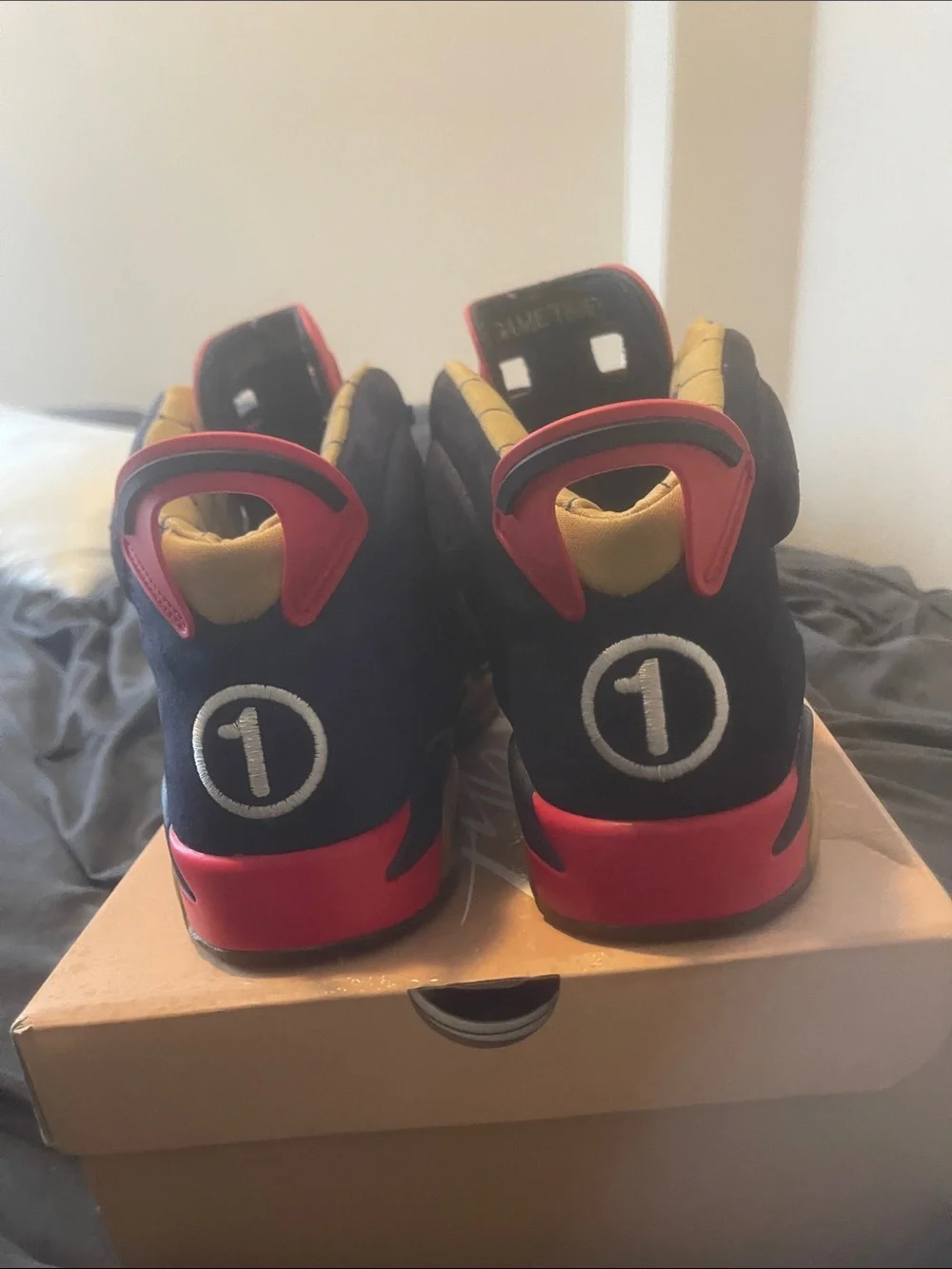 Jordan Men’s Athletic Shoes Navy Blue with Red and Gold Accents